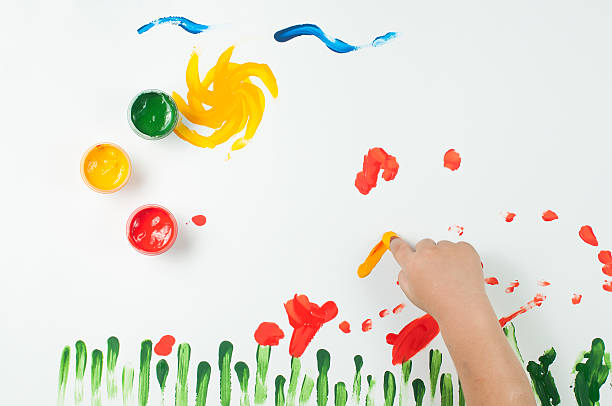 istock child draws ink on paper 500214376