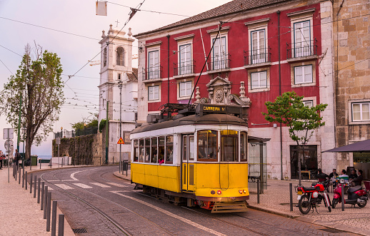 Lisbon, Portugal - Nov 14, 2023:  Lisbon's tram system has a long history, with some of the lines dating back to the late 19th century. Tram 28, an iconic route, takes a scenic route through Lisbon's historic neighborhoods, including Graça, Alfama, Baixa, and Estrela.