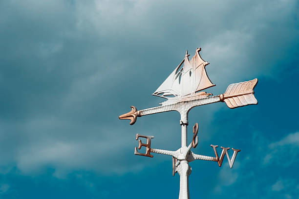 парусная лодка wind сменные против голубого неба с местом для копии - weather vane wind weather direction стоковые фото и изображения