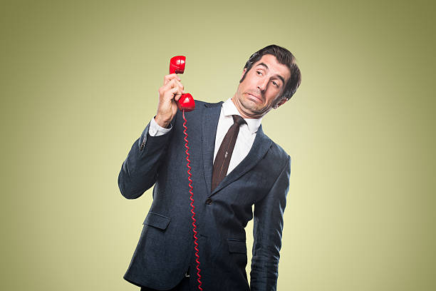 istock Nerdy Office Worker With Vintage Telephone 500216327