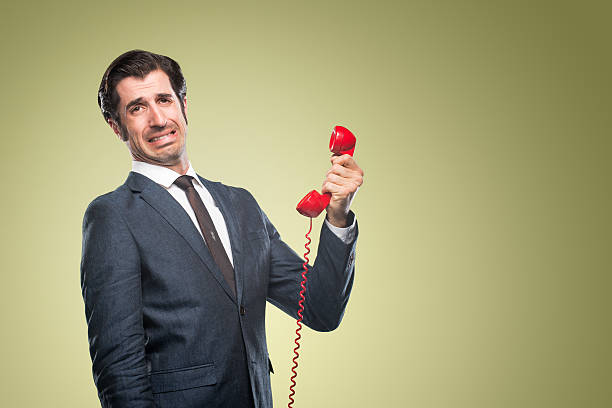 istock Nerdy Office Worker With Vintage Telephone 500216329