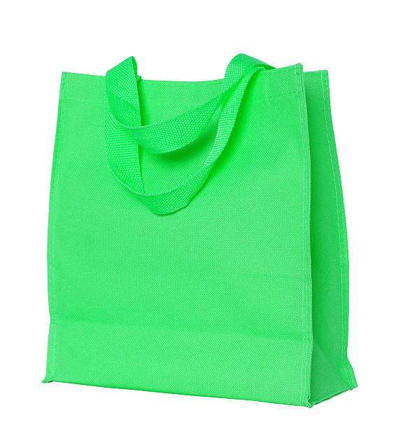 istock Green shopping bag isolated on white 500216963