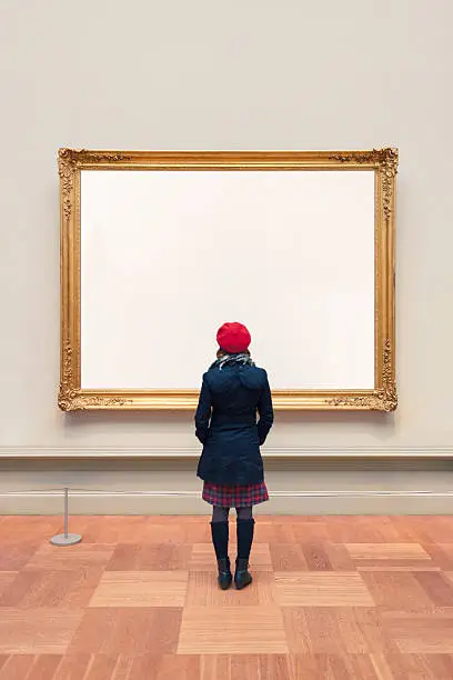 Photo of Woman visiting an Unidentifiable Gallery