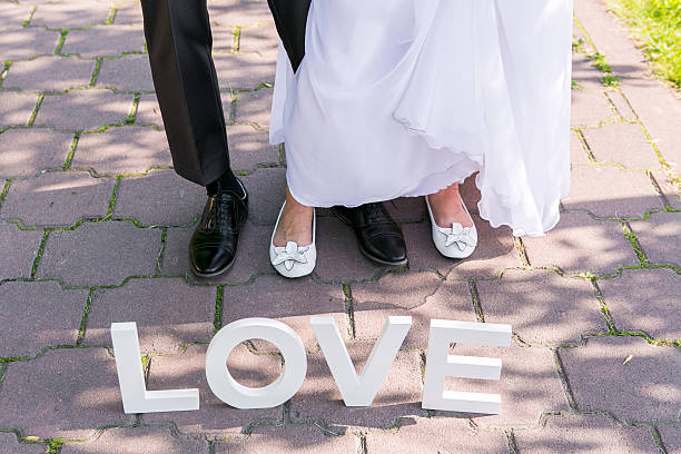 istock Feet of groom and bride 500217302