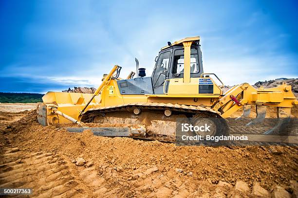 Excavator Working And Moving Earth In Construction Site Highway Stock Photo - Download Image Now