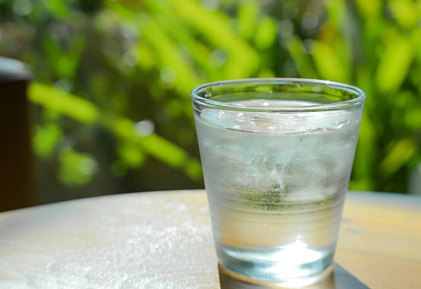 istock Glass water,Ice glass on green background. 500218108