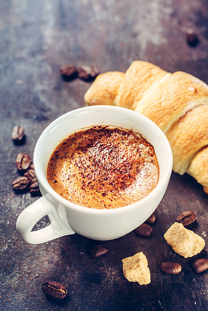 istock Coffee with crema and Croissant 500218196