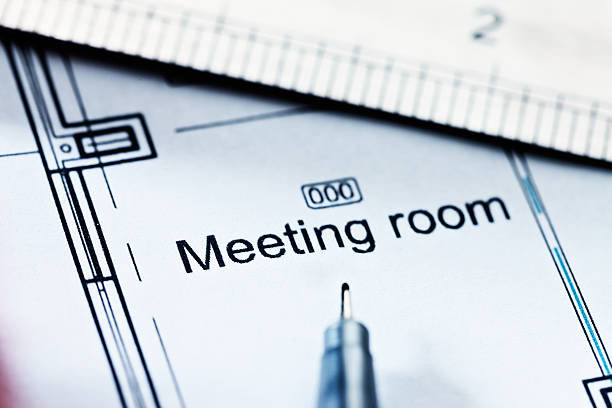 istock Architectural plans marked Meeting Room with pen and ruler 500221413