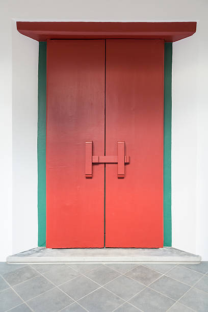 Traditional Thai style Buddhist church door of Salatham, Chiang Mai, Thailand.