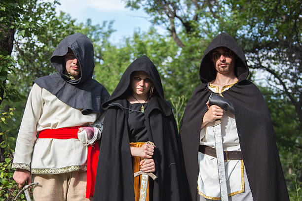 istock three knights in armor is fighting  at forest 500225060