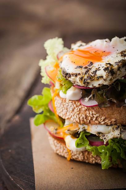 istock Sandwich with salad , vegetable and eggs on the wooden board 500226344