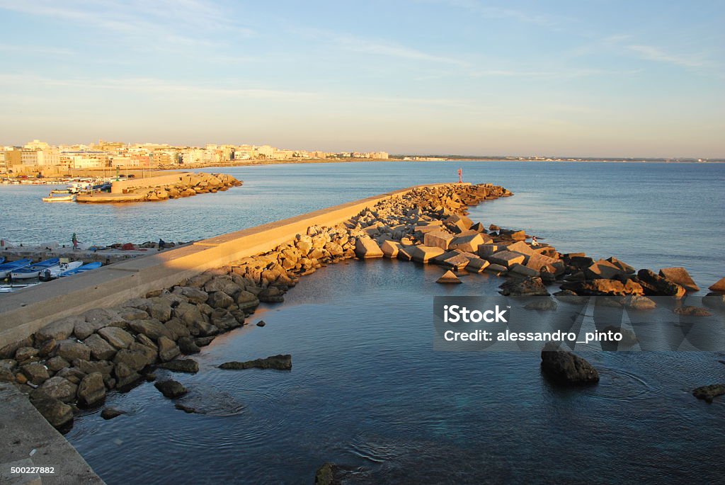 Sunset by the Dock Gallipoli near Lecce, Italy 2015 Stock Photo