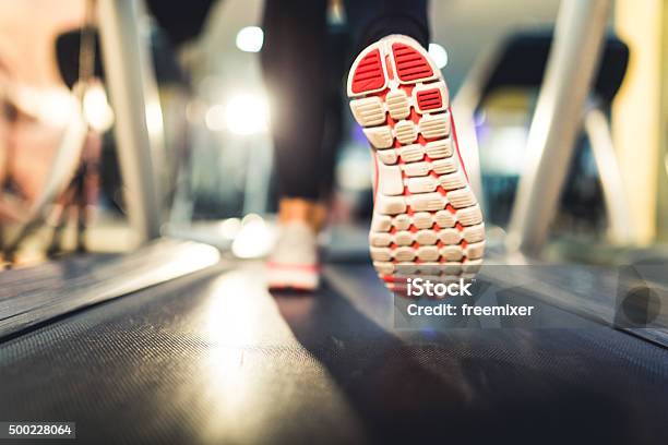Closeup Of Athlete Shoes While Running On Treadmill Stock Photo - Download Image Now