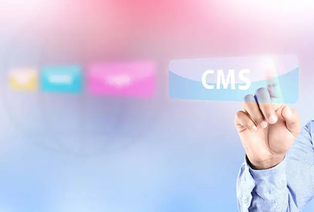 Hand pressing CMS button