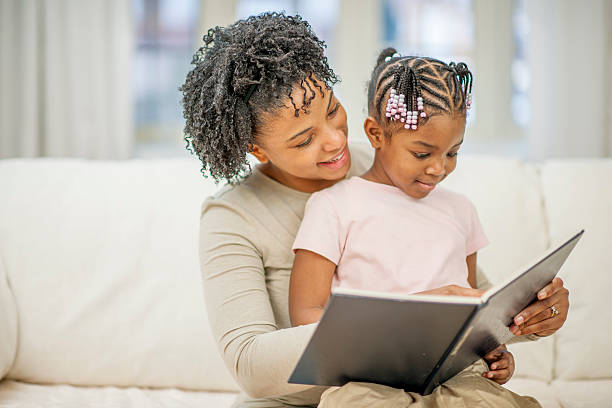 istock Reading a Book Together at Home 500230170