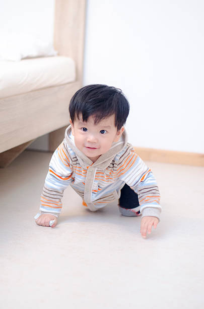 istock Asian Baby Boy crawling 500230508