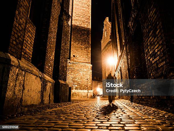 Illuminated Cobbled Street In Old City By Night Stock Photo - Download Image Now - Jack The Ripper, Street, London - England
