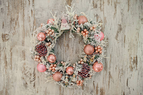 istock christmas wreath with pink decor and bubbles 500232108