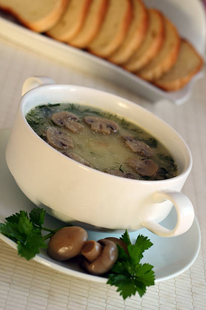 istock Soup with mushrooms in a bowl with a saucer 500234161