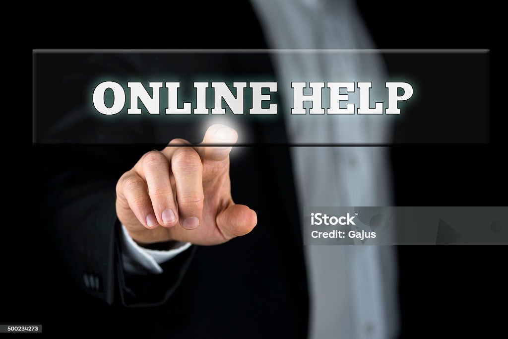 Online help Male hand activating an Online help button on virtual screen. Advice Stock Photo