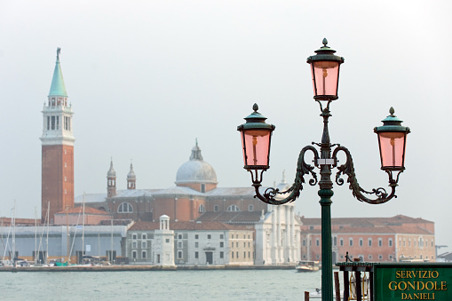 Gondola ride stop and street lamp at Venice waterfront