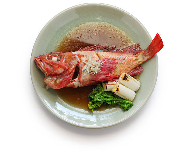simmered fish with sweetened soy sauce, japanese cuisine simmered kinki rockfish with sweetened soy sauce, japanese cuisine isolated on white background ocean perch stock pictures, royalty-free photos & images