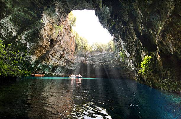 mellisani lake Famous melissani lake on Kefalonia island - GreeceInside famous mellisani lake with on Kefalonia island - GreeceFamous mellisani lake on Kefalonia island - Greece kefalonia stock pictures, royalty-free photos & images