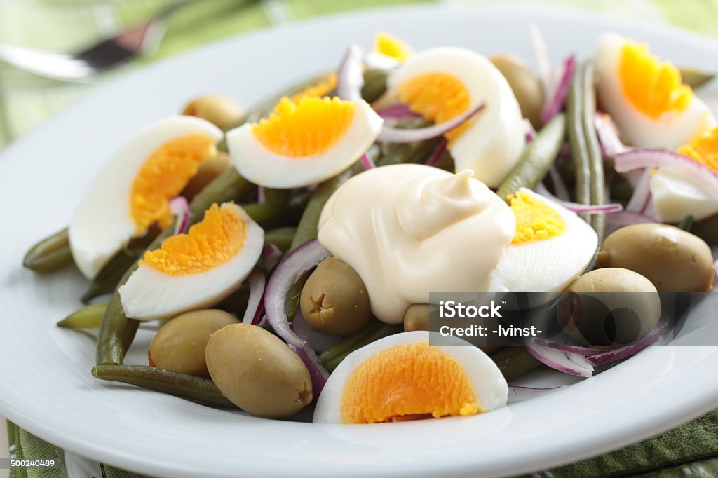 Salad Salad with green bean, olives, onion, and boiled egg Appetizer Stock Photo