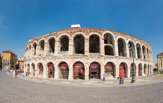Verona, Italy - June 11, 2014. The doors are opend of the ticket and souvenir shop at the Arena di Verona, waiting for tourists which are interested in operas from Verdi especially.
