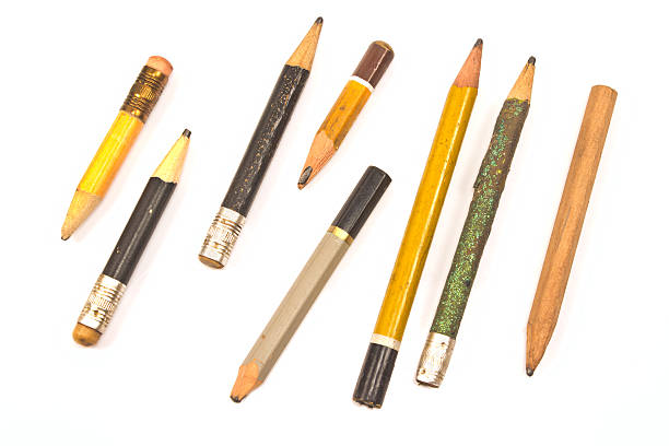 istock Used wooden pencils isolated on white 500254410