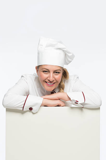 istock Modern female chef with menu and chef 500255829