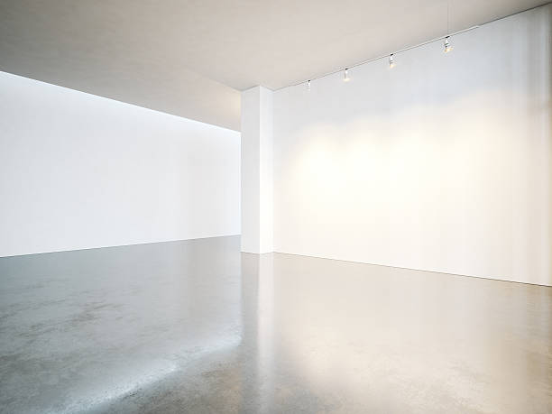 istock Empty gallery interior with white canvas and concrete floor. 3d 500255978