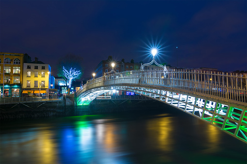 Dublin, Ireland at Christmas with waterfront and historic Ha'penny Bridge