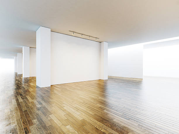 istock White and blank canvas in museum interior with wooden floor 500257574