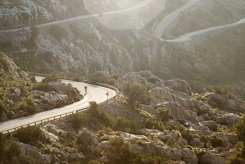 A lone cyclist ascends the infamous Sa Calobra climb in Northern Mallorca.