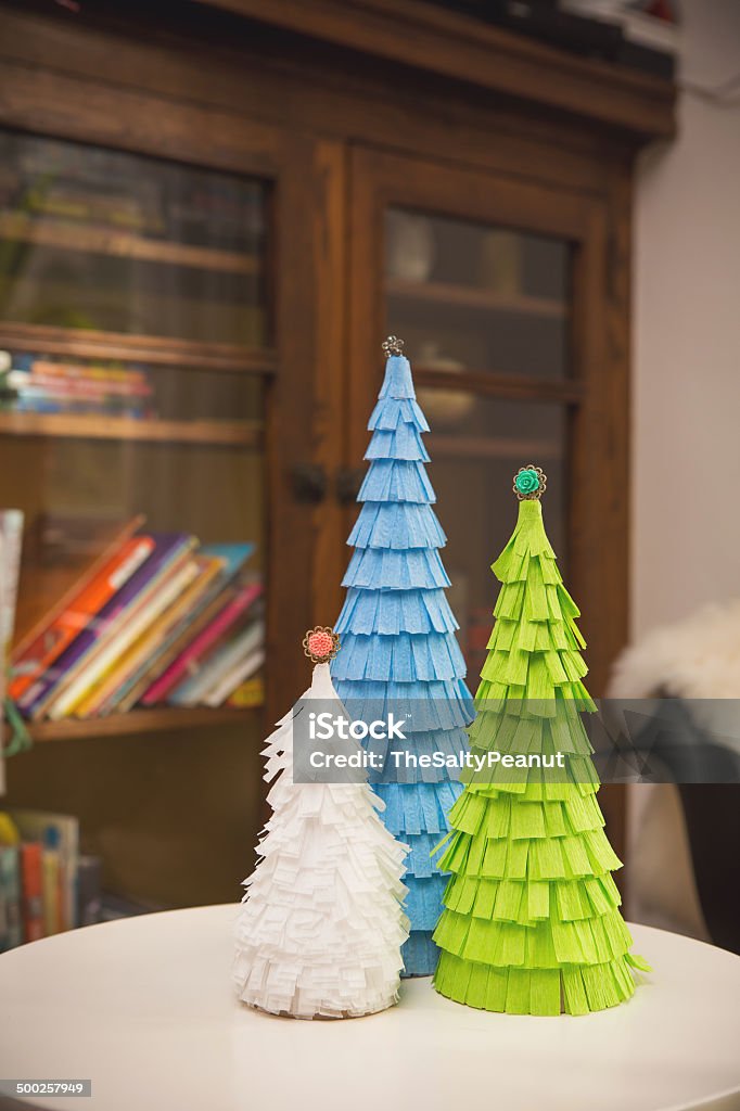 Christmas trees craft project streamers Christmas craft project using streamers and buttons, room for copy space. Art And Craft Stock Photo