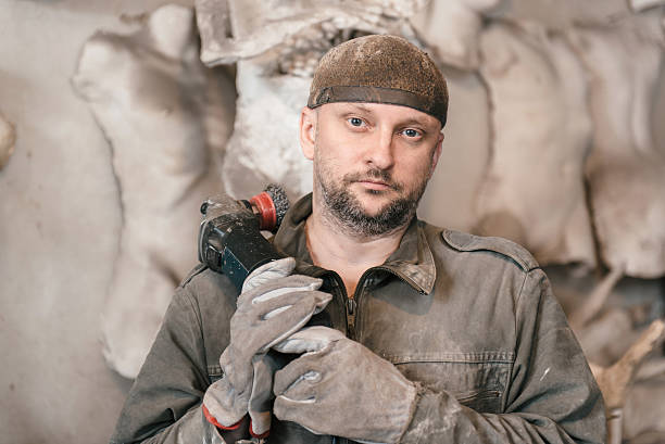 istock Portrait of sculpture man in his home studio 500258088
