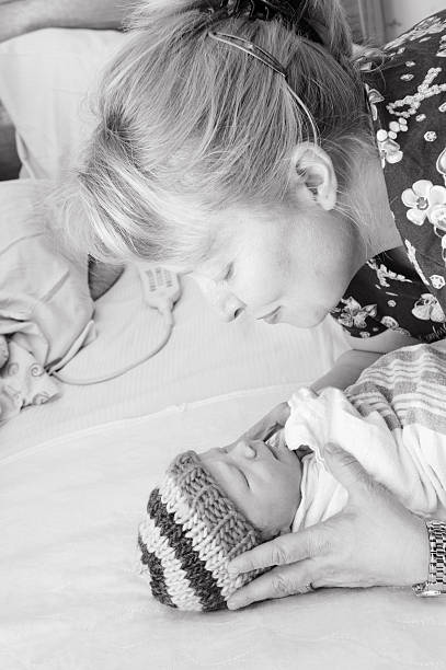 istock Swaddled Newborn Boy 500258887