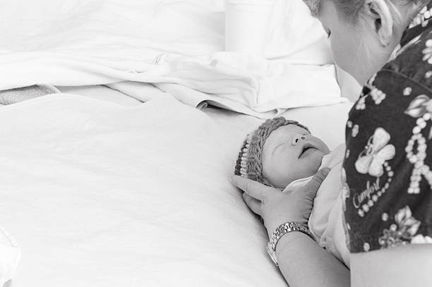 istock Swaddled Newborn Boy 500258897