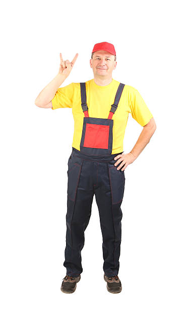 istock Man in working clothes showing rock sign. 500260689