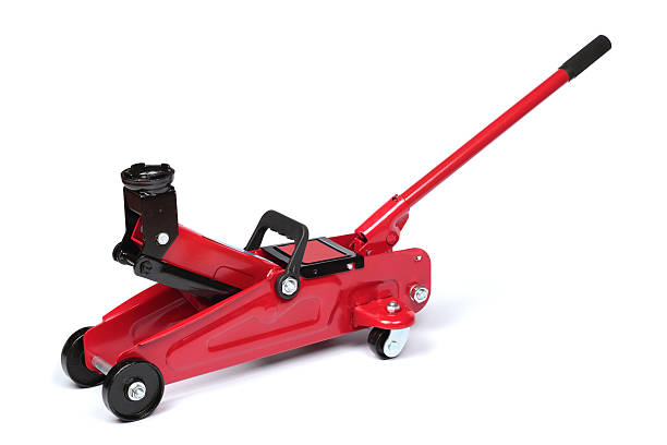Hydraulic floor jack Red hydraulic floor jack isolated on white background hydraulic platform photos stock pictures, royalty-free photos & images