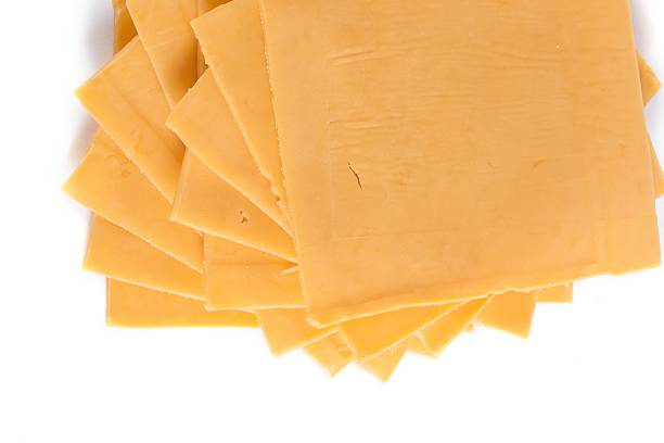 istock slices of cheddar cheese 500261880