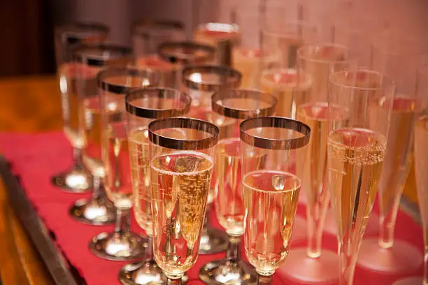 Glasses of champagne on the table, selective focus