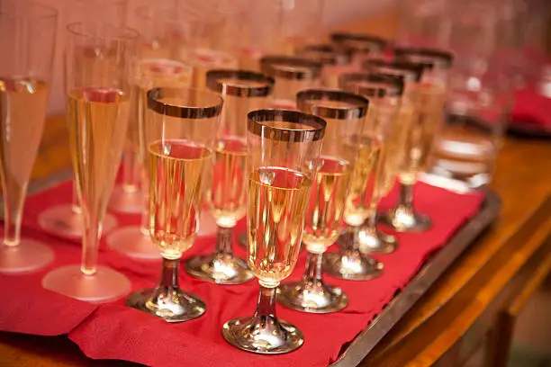 Glasses of champagne on the table, selective focus