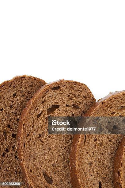 Slices Of Pumpernickel Bread Close Up Stock Photo - Download Image Now - 2015, Barley, Bread