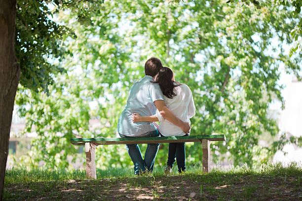 istock Couple in Love Sitting on the Bench 500276255