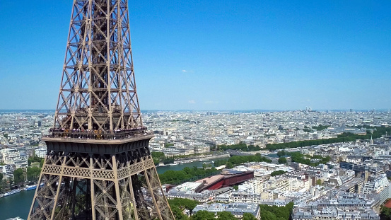 Paris, France - July 09 2020: Aerial view the Eiffel Tower from Tour Montparnasse observation desk with the Trocadero and La Defense business district in the background - Paris, France