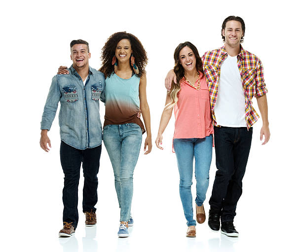 istock Four friends walking together 500278957