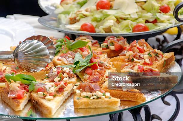 Bruschetta And Caesar Salad Stock Photo - Download Image Now - American Culture, Antipasto, Appetizer