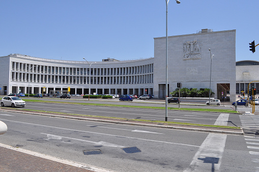 Rome, Italy - June 23, 2014: INPS Istituto Nazionale della Previdenza Sociale meaning National Institute of Pensions is a masterpiece of Fascist architecture